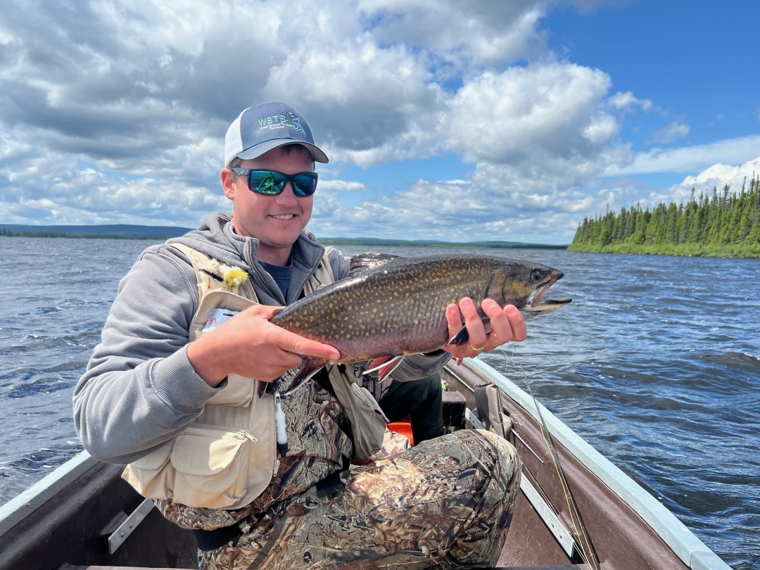 Catching big trout in the lake looking portion of the river